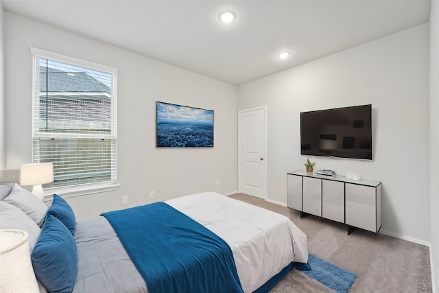 bedroom featuring carpet