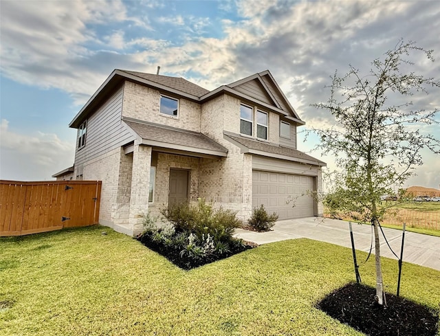 view of front facade with a garage and a front yard