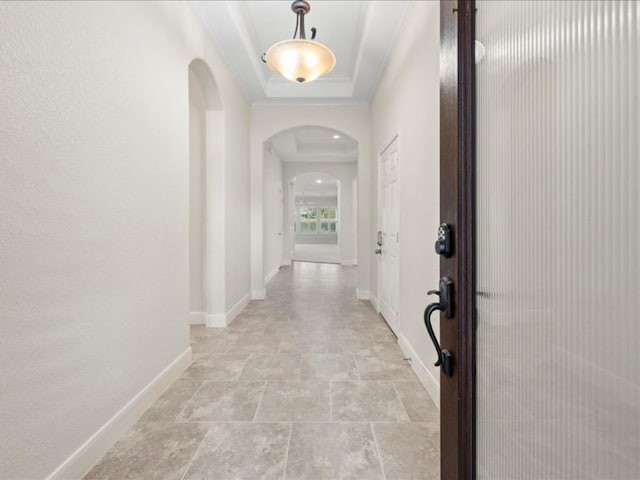 corridor with light tile patterned floors