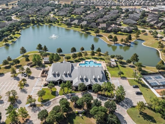 9410 Trinity Trail Ct, Cypress, TX 77433 - aerial overview of property's location featuring a large body of water, a pool, and nearby suburban area