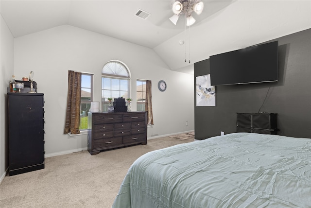 carpeted bedroom with lofted ceiling and ceiling fan