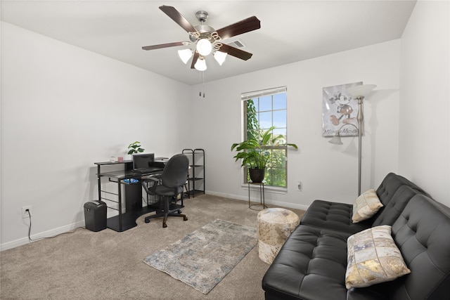 office area with carpet and ceiling fan