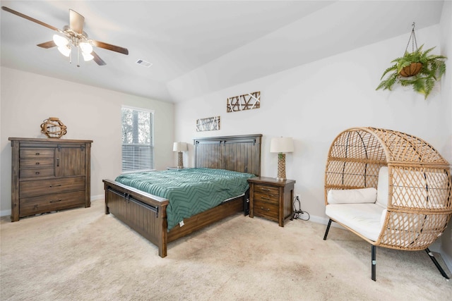 bedroom with light carpet, ceiling fan, and lofted ceiling