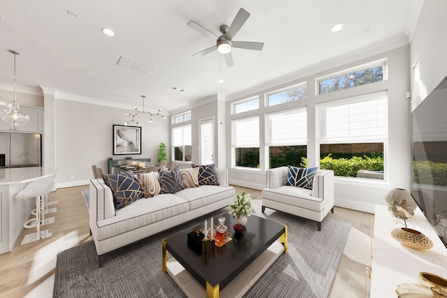 living room with ceiling fan, light hardwood / wood-style floors, and ornamental molding