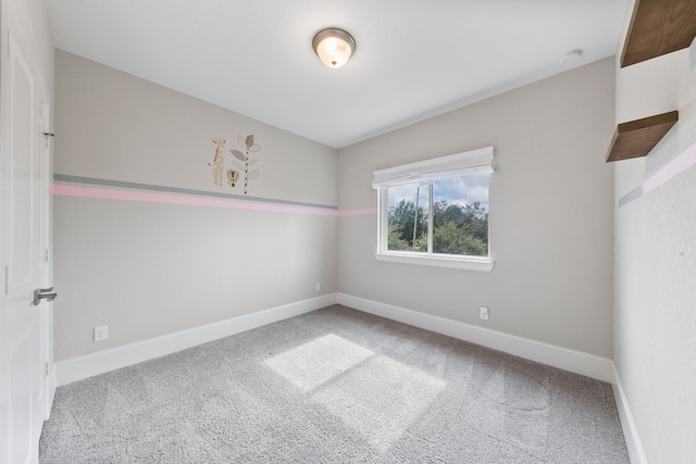 spare room featuring carpet flooring