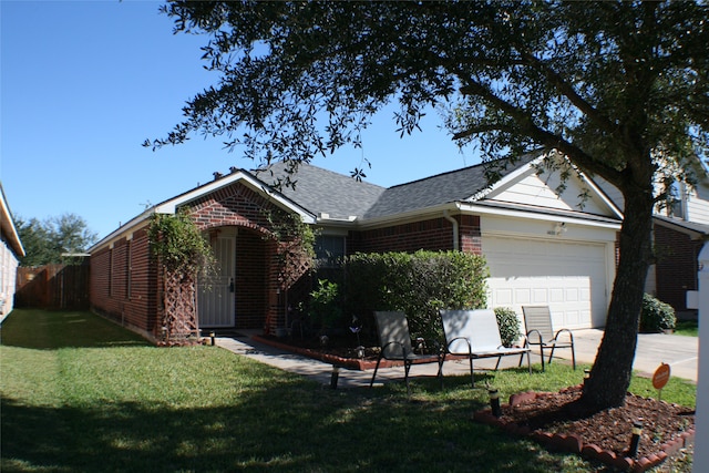 single story home with a garage and a front yard