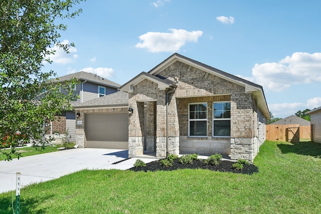 view of front of property featuring a garage and a front yard