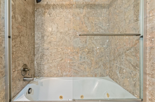 bathroom featuring a washtub