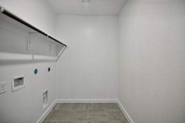 clothes washing area with electric dryer hookup, washer hookup, and gas dryer hookup