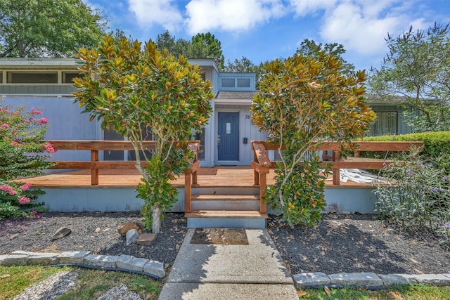 view of front of property featuring a deck