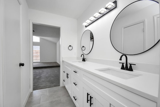 bathroom with vanity and tile patterned floors