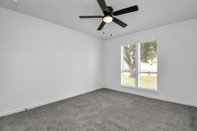 empty room with carpet and ceiling fan