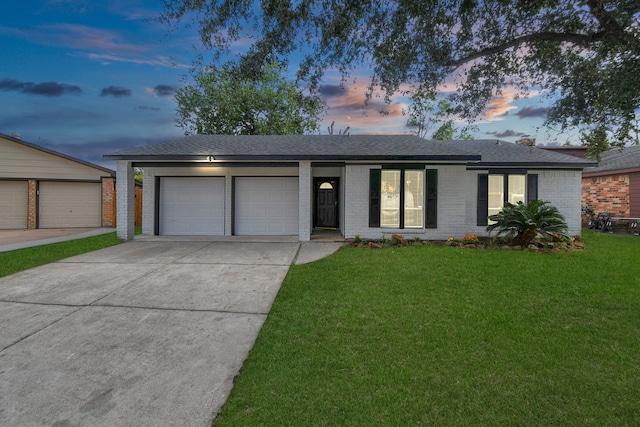 ranch-style home featuring a yard