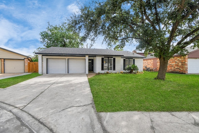 single story home featuring a front yard