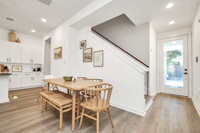 dining area with light wood-type flooring