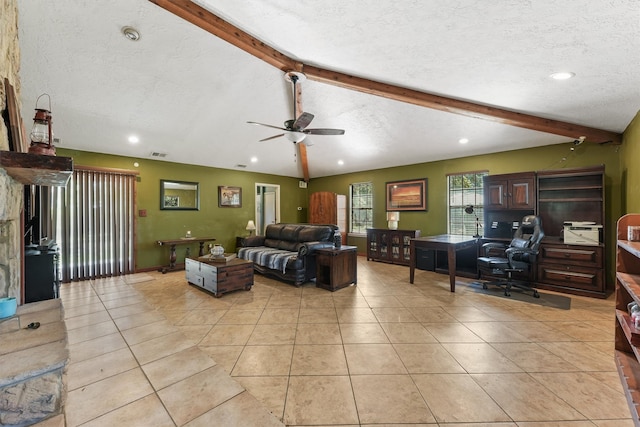 living room featuring a textured ceiling and light tile patterned floors