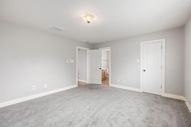 unfurnished bedroom featuring carpet