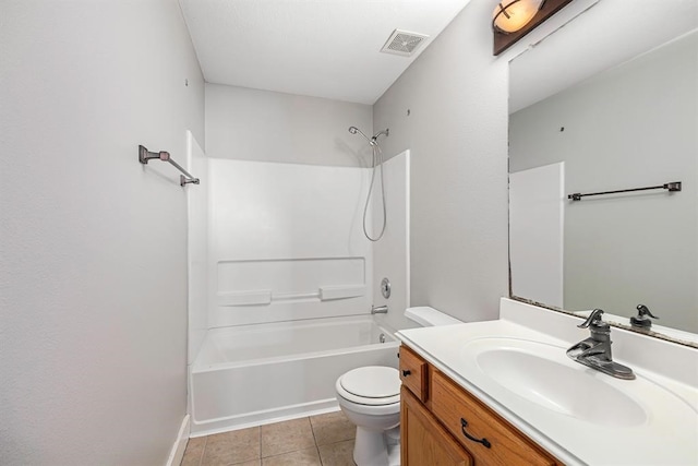 full bathroom featuring vanity, tile patterned flooring, toilet, and bathing tub / shower combination