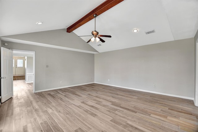 spare room with vaulted ceiling with beams, ceiling fan, and light hardwood / wood-style floors