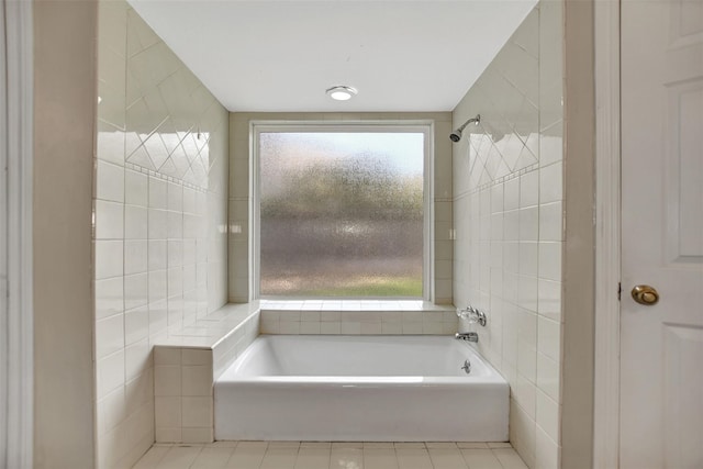 bathroom featuring tile walls, independent shower and bath, tile patterned floors, and plenty of natural light