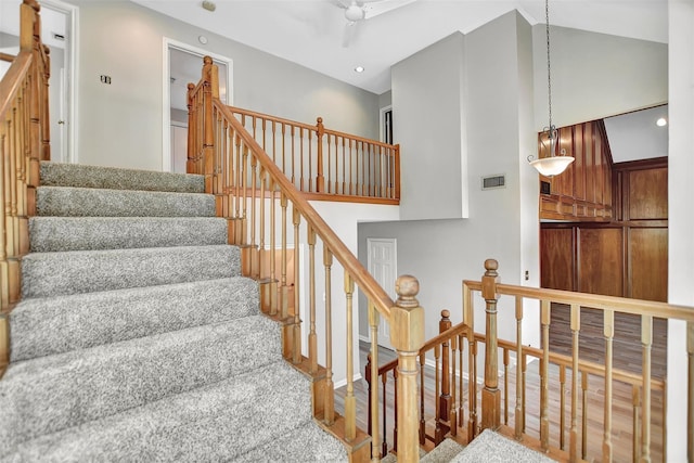 stairs featuring wood-type flooring