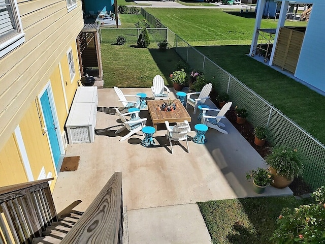 view of patio / terrace featuring an outdoor fire pit