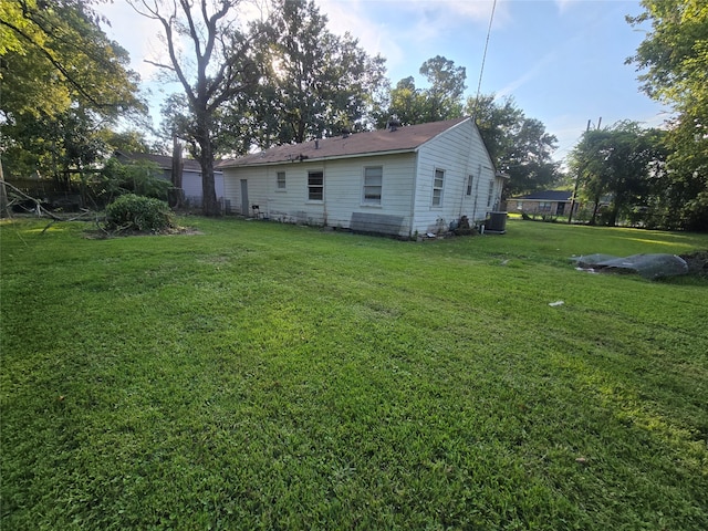 view of yard with central AC