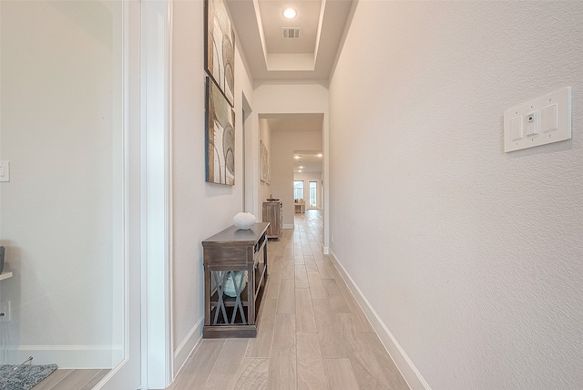 hallway featuring light hardwood / wood-style flooring