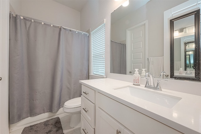 full bathroom with vanity, toilet, shower / bath combo, and tile patterned flooring