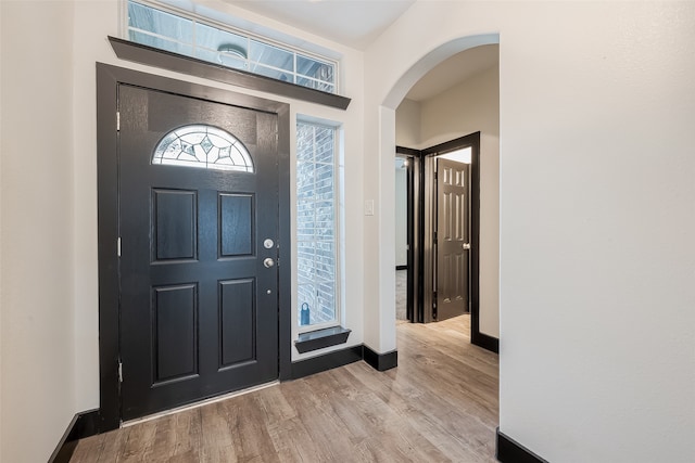 foyer with light wood-type flooring