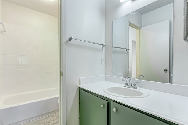 bathroom with vanity and tub / shower combination