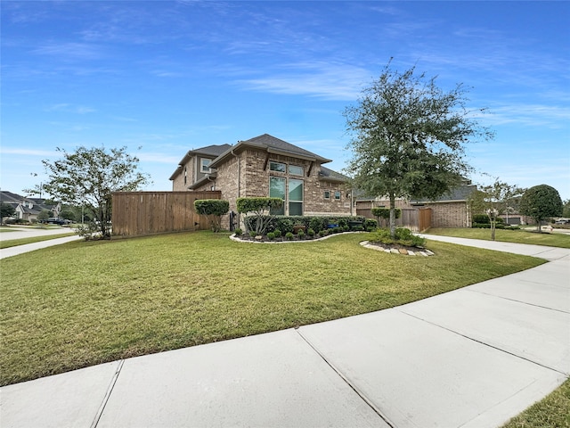 view of front of property with a front lawn