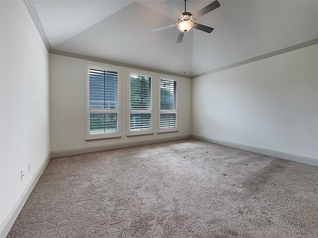 spare room with ornamental molding, lofted ceiling, carpet, and ceiling fan