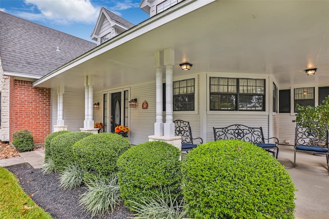 doorway to property featuring a porch