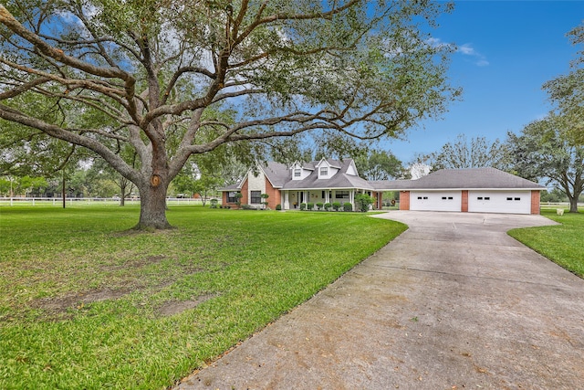 view of front facade featuring a garage and a front lawn