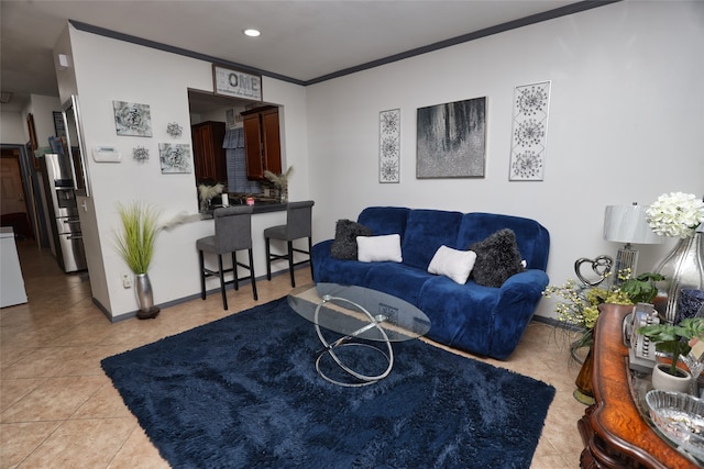 tiled living room featuring crown molding