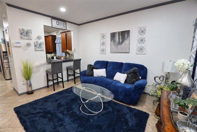 living room featuring crown molding and light tile patterned floors