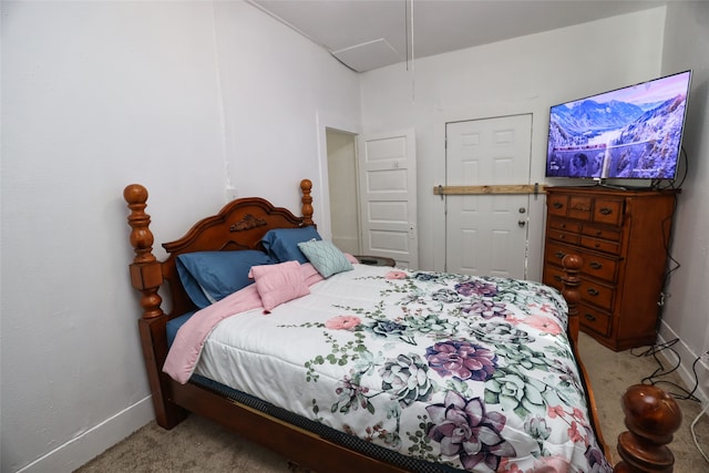 bedroom with light colored carpet