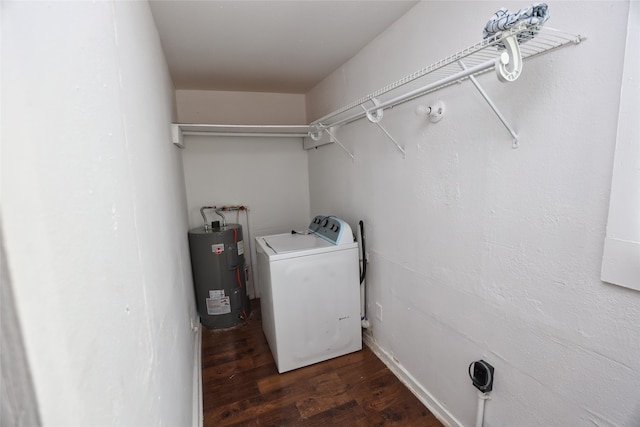 washroom with washer / dryer, water heater, and dark wood-type flooring