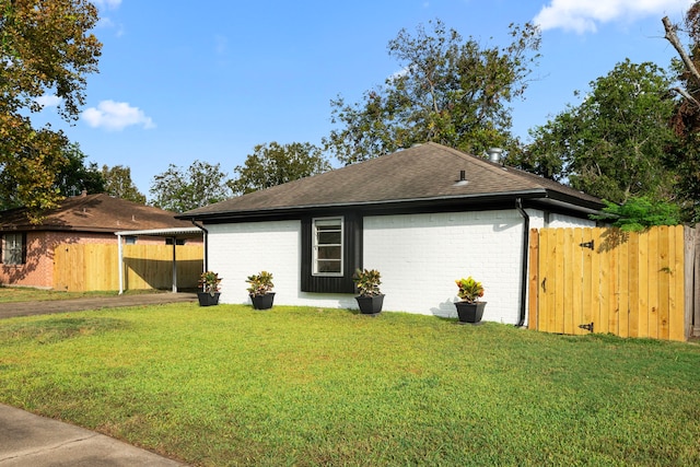 view of home's exterior featuring a yard