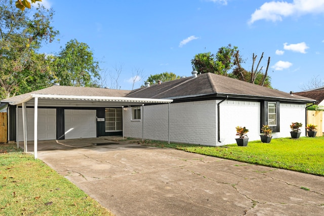 ranch-style house with a garage and a front yard