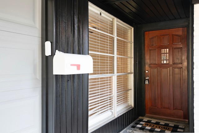 doorway to property featuring a porch