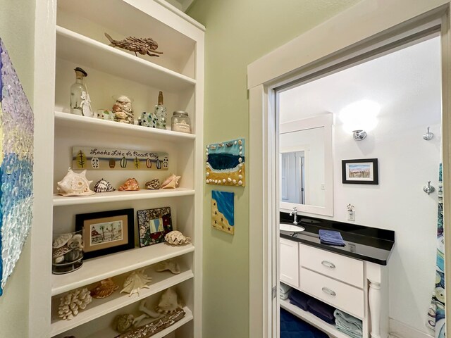 214 Biloxi, Crystal Beach, TX 77650 - pantry featuring a sink