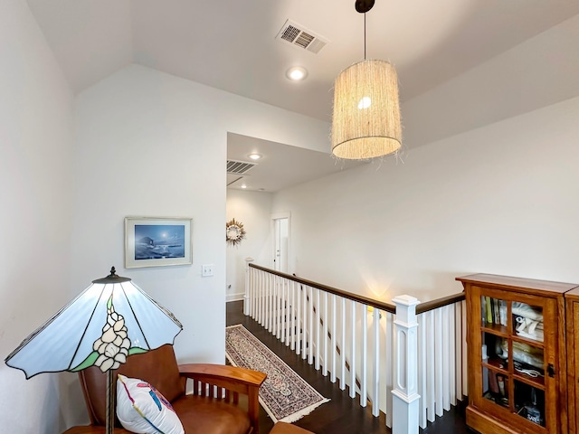 214 Biloxi, Crystal Beach, TX 77650 - hallway featuring an upstairs landing, dark wood-style flooring, and recessed lighting