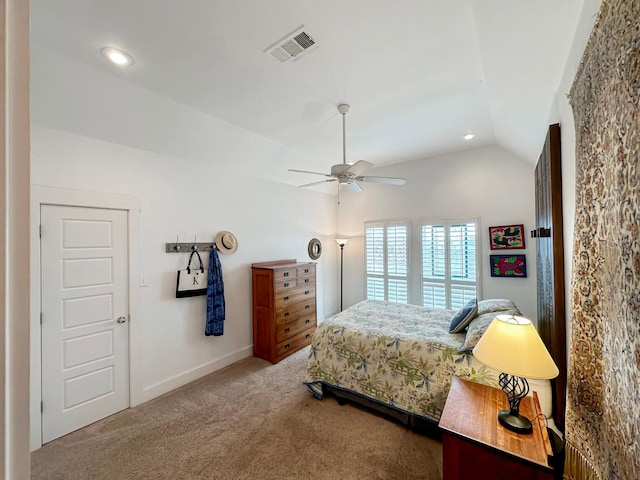 bedroom with ceiling fan, carpet flooring, and lofted ceiling