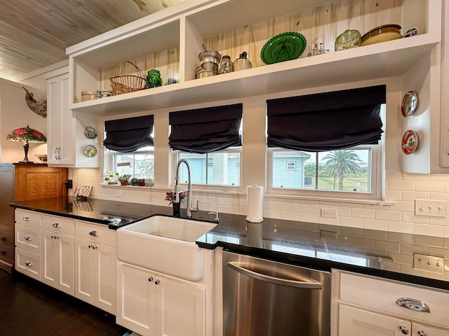 214 Biloxi, Crystal Beach, TX 77650 - kitchen featuring stainless steel dishwasher, open shelves, a sink, and dark countertops