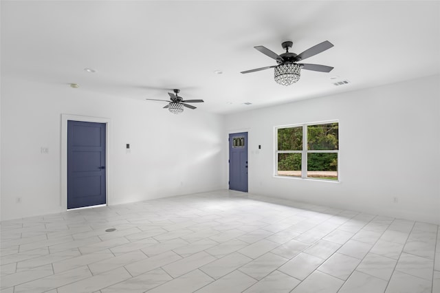 spare room featuring ceiling fan