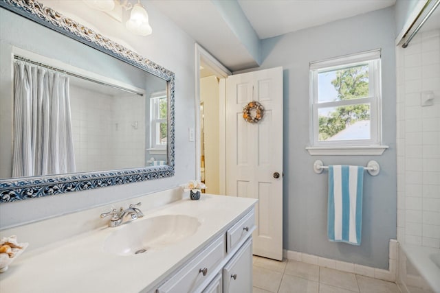 bathroom with tile patterned flooring, vanity, and shower / bathtub combination with curtain