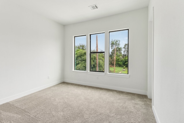 empty room with carpet flooring