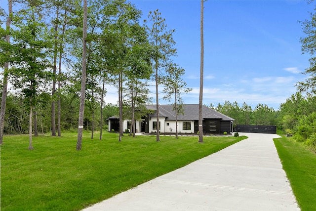 view of front of property with a front lawn